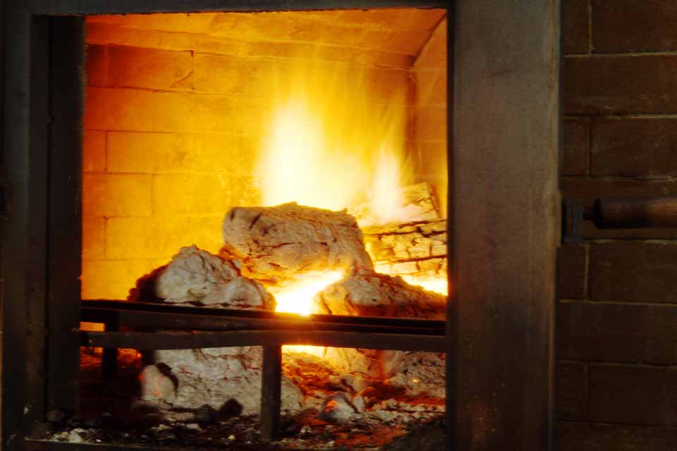 Our best kept secret, our custom-built wood-fired oven